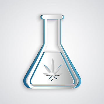 Et reagensglass med et cannabisblad-ikon, HHCH-forbindelsen produseres i et laboratorium.